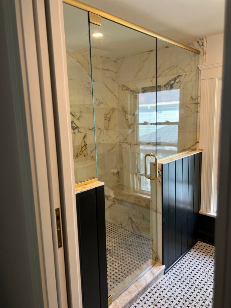 12 FRAMELESS ENCLOSURE - KNEE WALLS